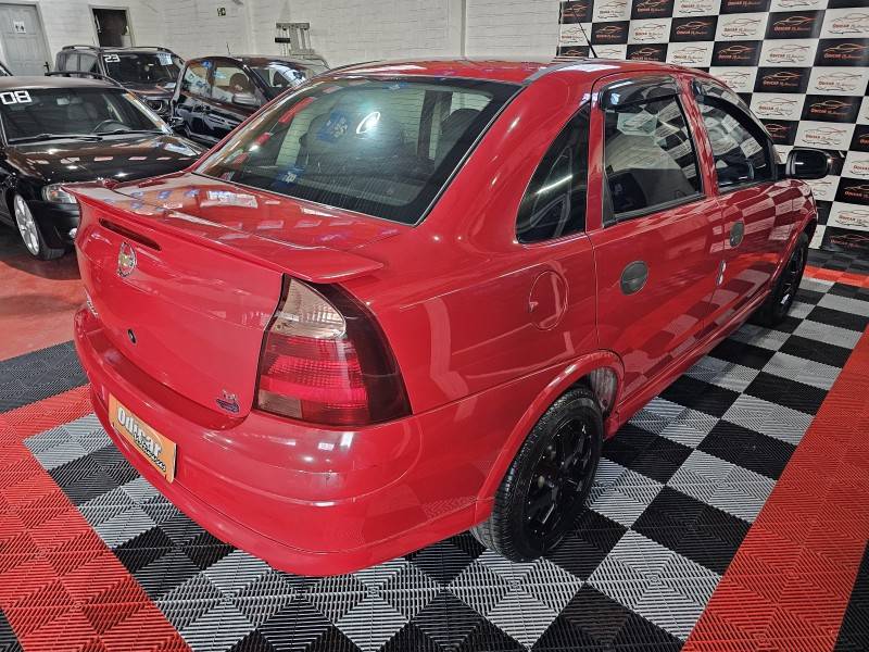 CHEVROLET - CORSA - 2009/2010 - Vermelha - R$ 28.900,00